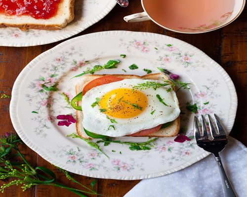 Breakfast table with tea and eggs